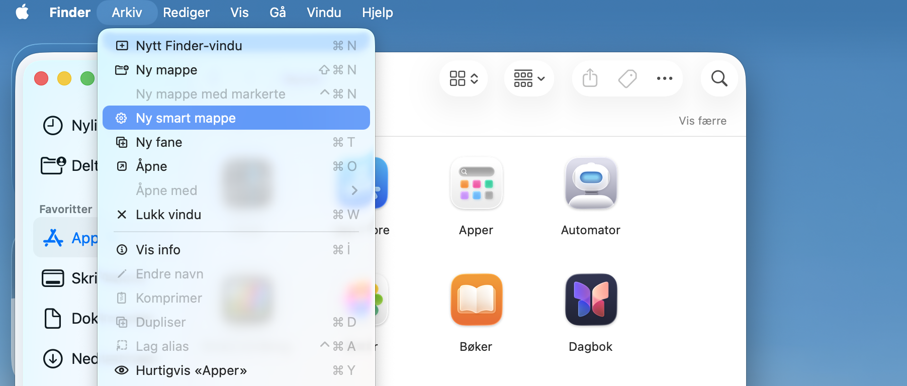 Finn og fjern duplikatfiler manuelt i Finder. For å gjøre dette, klikk på Finder i Dock og velg Arkiv > Ny smart mappe i menylinjen.