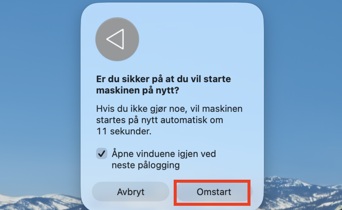 Bekreftelsesvinduet for omstart på Mac. Prøv å starte maskinen på nytt når en ekstern harddisk ikke gjenkjennes i macOS.