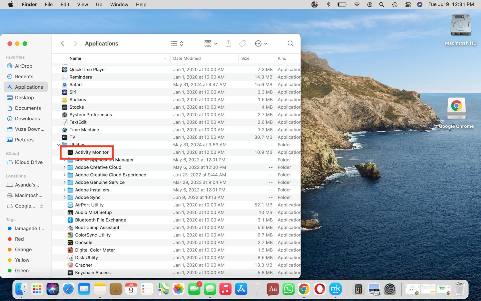 The Applications folder is opened on a Mac. Select Utilities, followed by Activity Monitor, to force quit CoreServicesUIAgent.