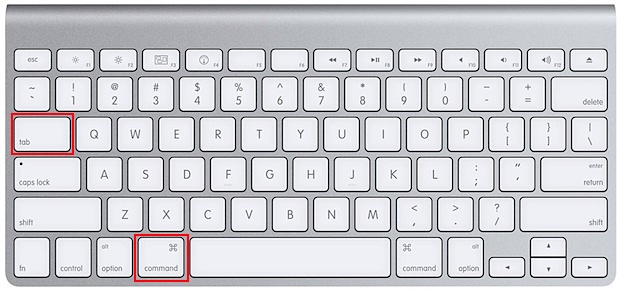 Apple keyboard with the Command and Tab keys highlighted, the shortcut that opens the App Switcher overlay on a Mac to switch between apps.