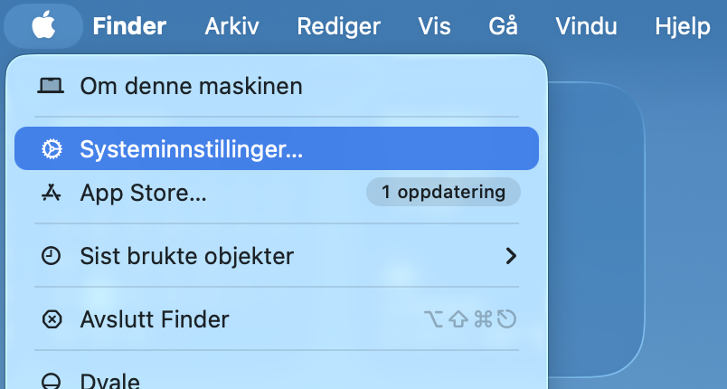 For å redusere ressurskrevende visuelle effekter som belaster Macen, må du først åpne systeminnstillingene: Klikk på Apple-menyen øverst til venstre på skjermen og velg Systeminnstillinger.