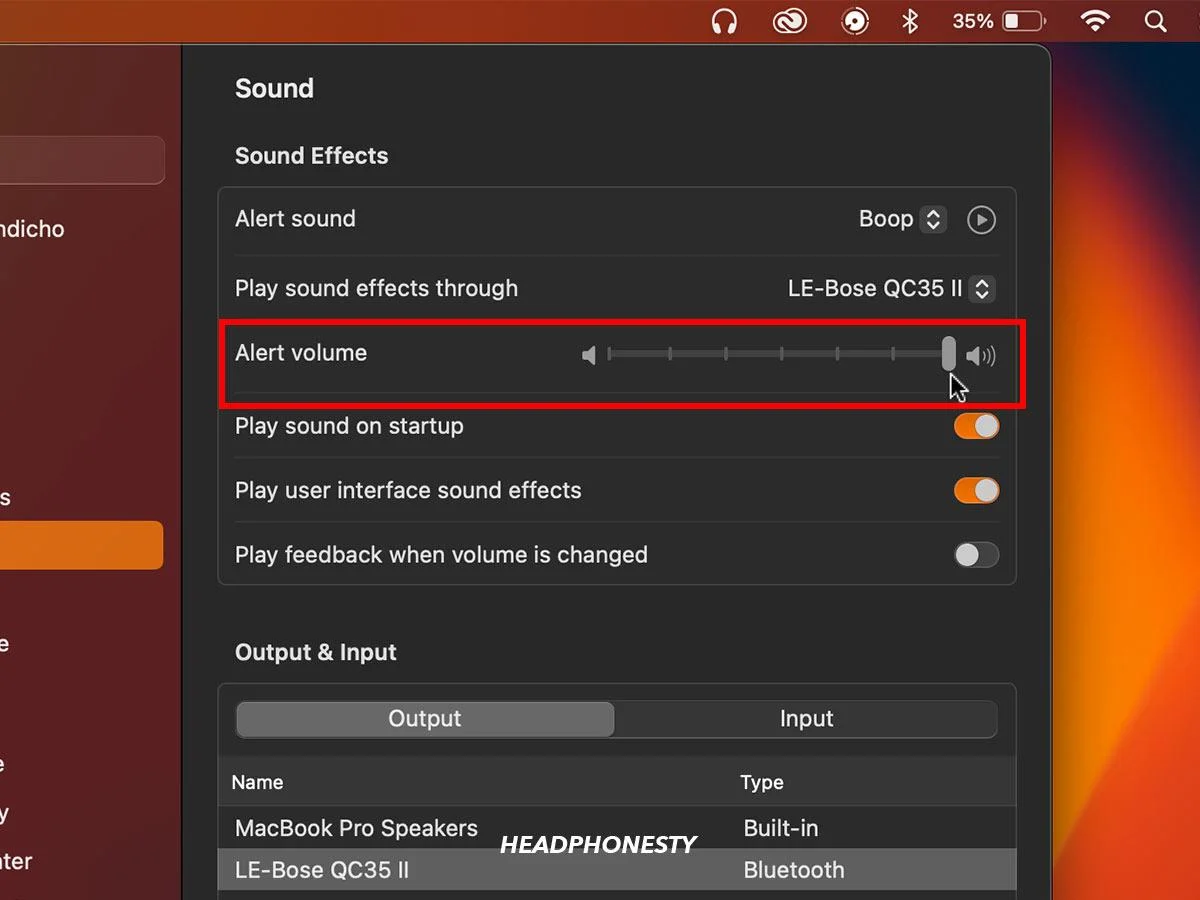 Sound Settings are open on a Mac. Drag the Alert volume slider to the left or right to adjust audio settings for your Bose headphones on your Mac.