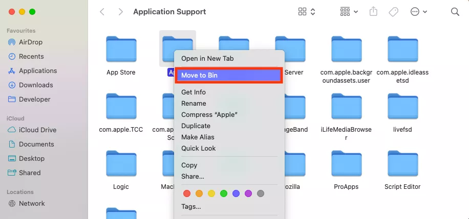 The Applications folder in Finder on Mac. Select a folder infected by Bundlore, right-click it, then select Move to Trash to delete it.