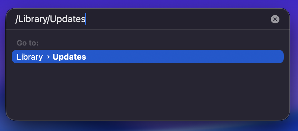 To remove partial updates and re-download, open Finder, click on Go to Folder in the menu bar, and type /Library/Updates in the search box.