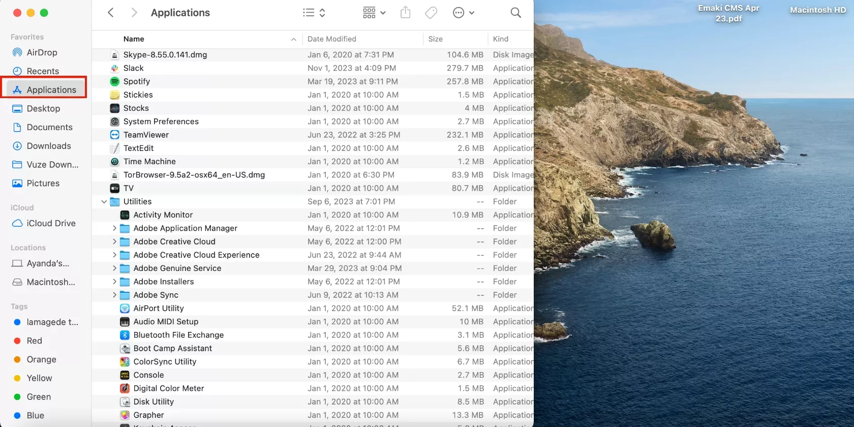 The Applications folder is open in Finder on a MacBook. Open Applications to remove the DuckDuckGo app from your Mac.