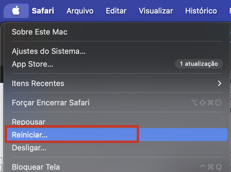 O menu Apple em um Mac, com a opção Reiniciar destacada. Como corrigir a Touch Bar no MacBook Pro: reinicie o seu Mac.