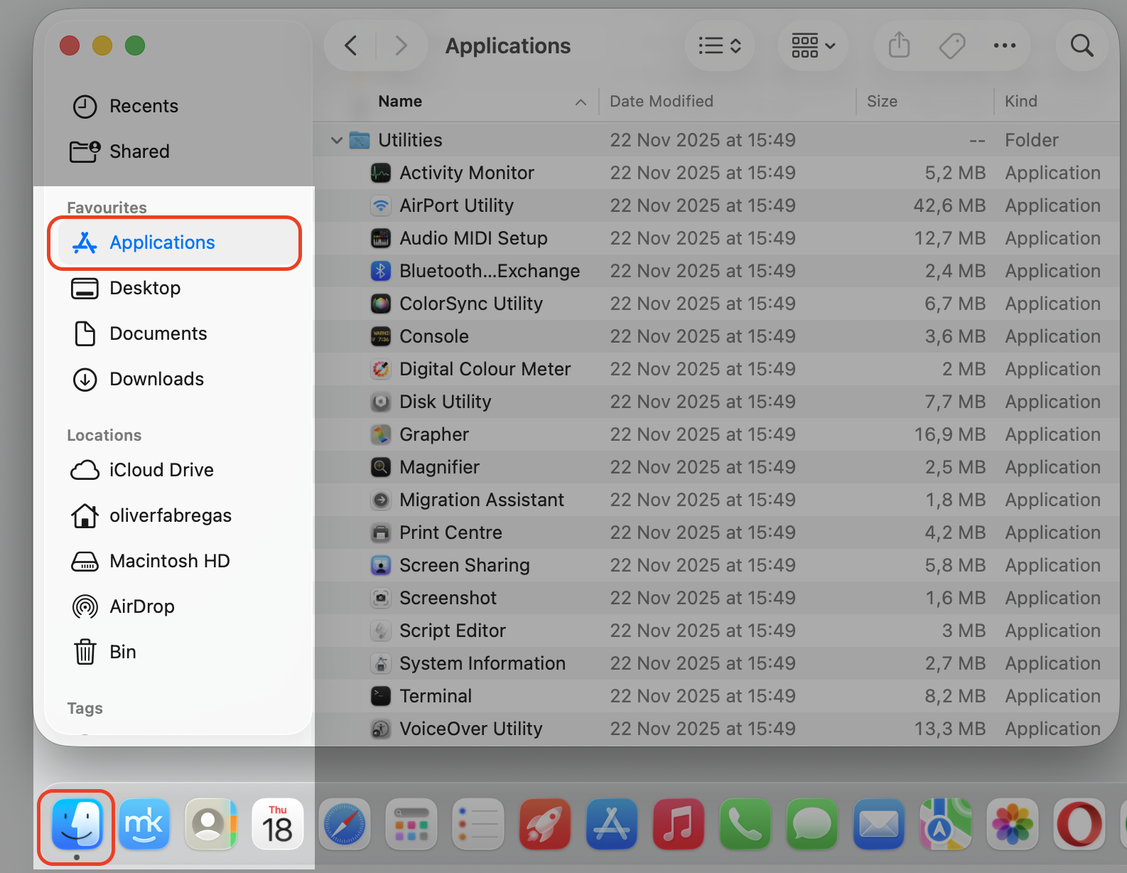 Finder window on a MacBook running macOS Tahoe, with Applications selected in the left sidebar to open the Utilities folder.
