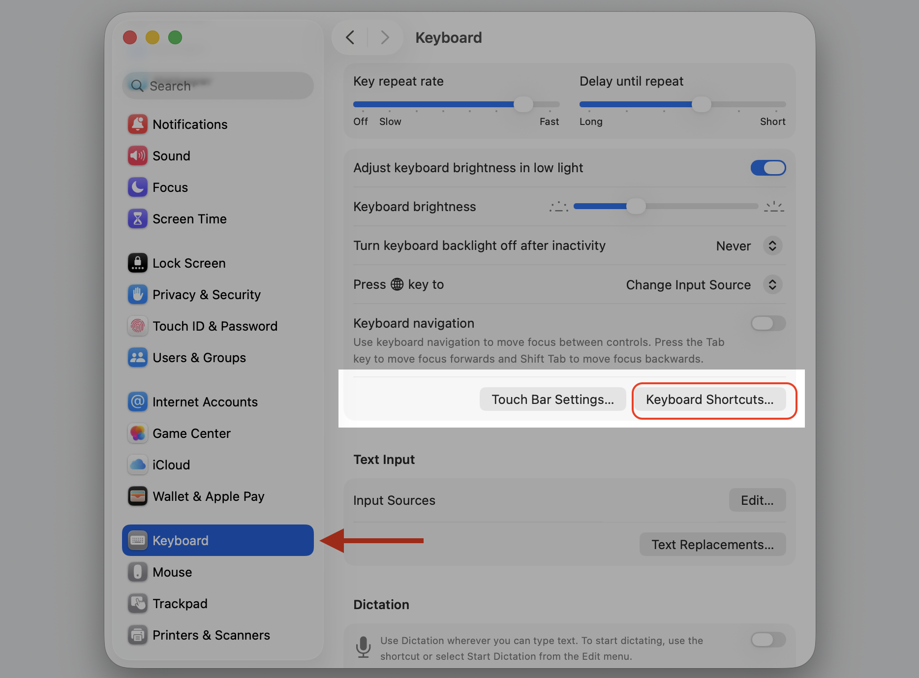 The Keyboard pane in macOS System Settings on a MacBook, where you click Keyboard Shortcuts to review hotkeys that stopped working.