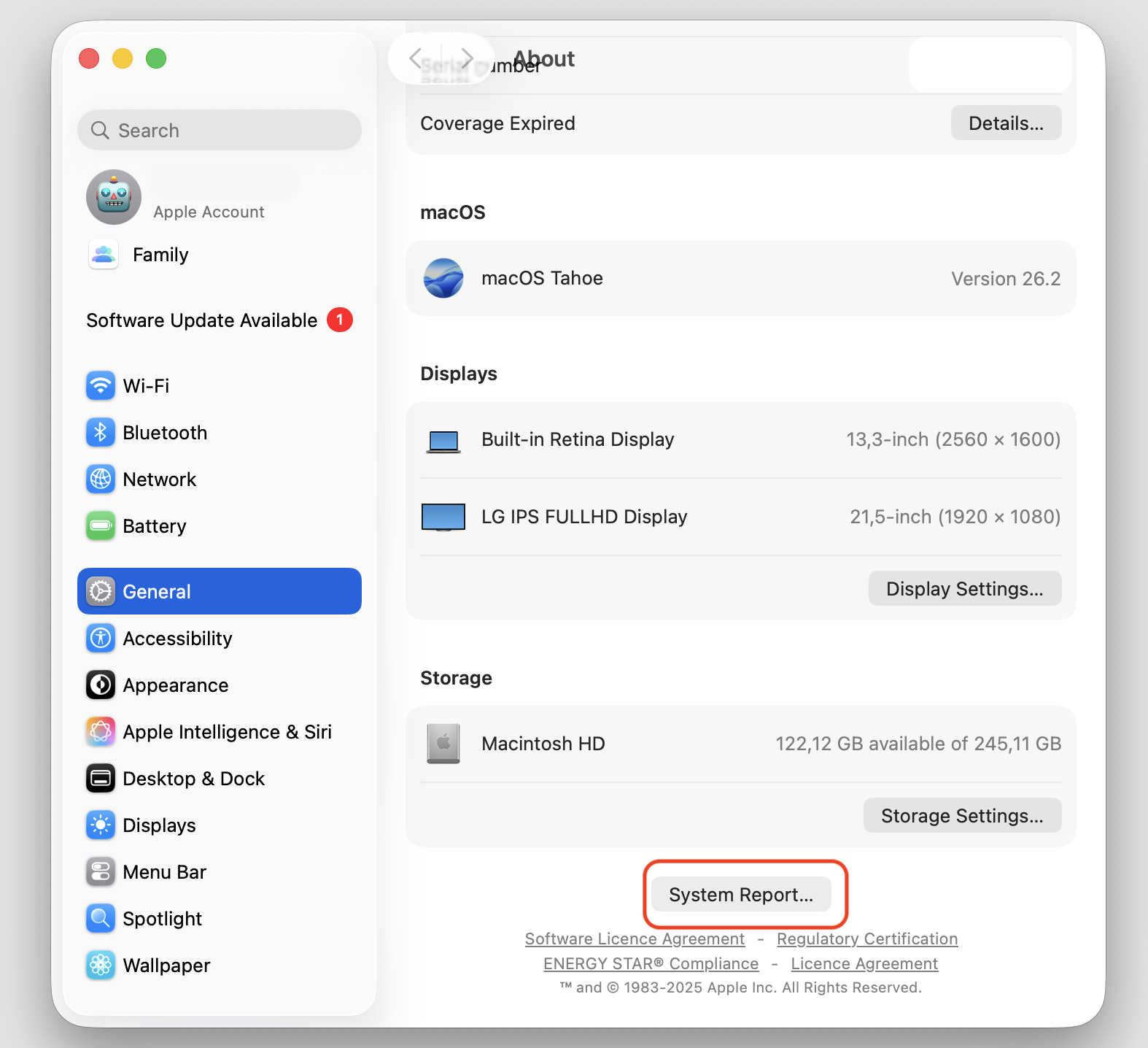 The About panel in System Settings on macOS Tahoe 26.2, showing the System Report button used to view your Apple computer's full specs.
