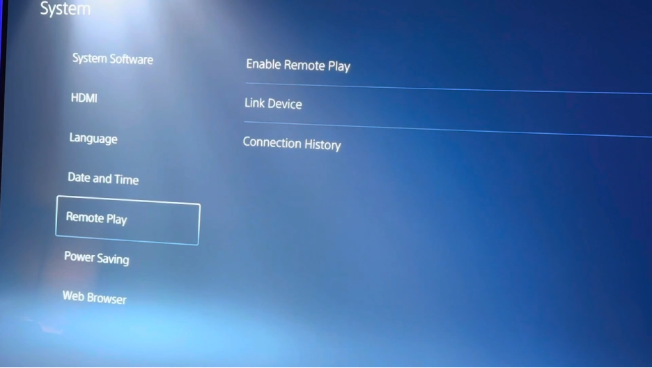 To use a MacBook as a monitor using Remote Play, go to Settings on your PlayStation, select System, choose Remote Play, then turn on Enable Remote Play.