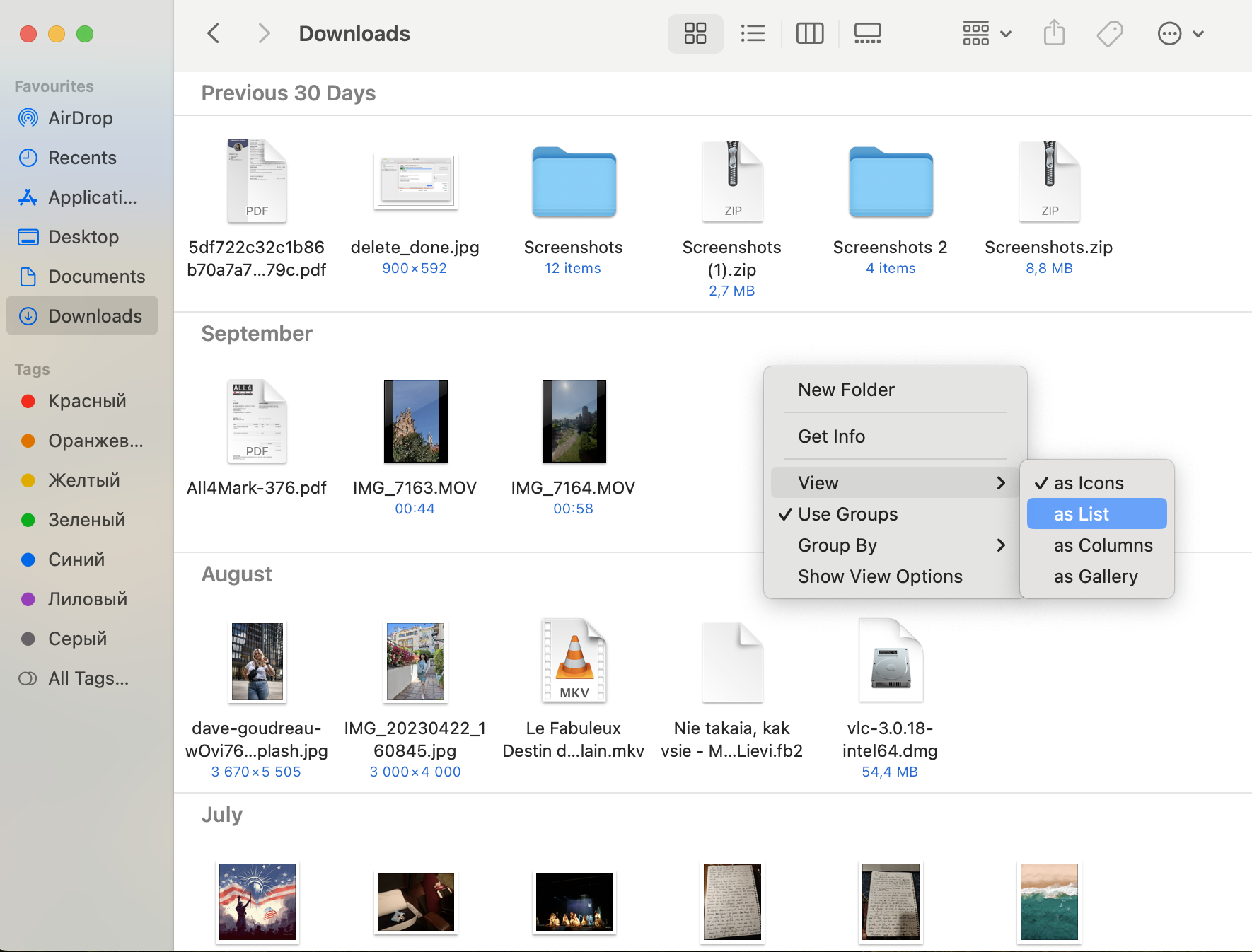 If you want to alter your Downloads folder view, right-click inside your Downloads folder, go to Sort By > As List. If you want to alter your Downloads folder view, right-click inside your Downloads folder, go to Sort By > As List.