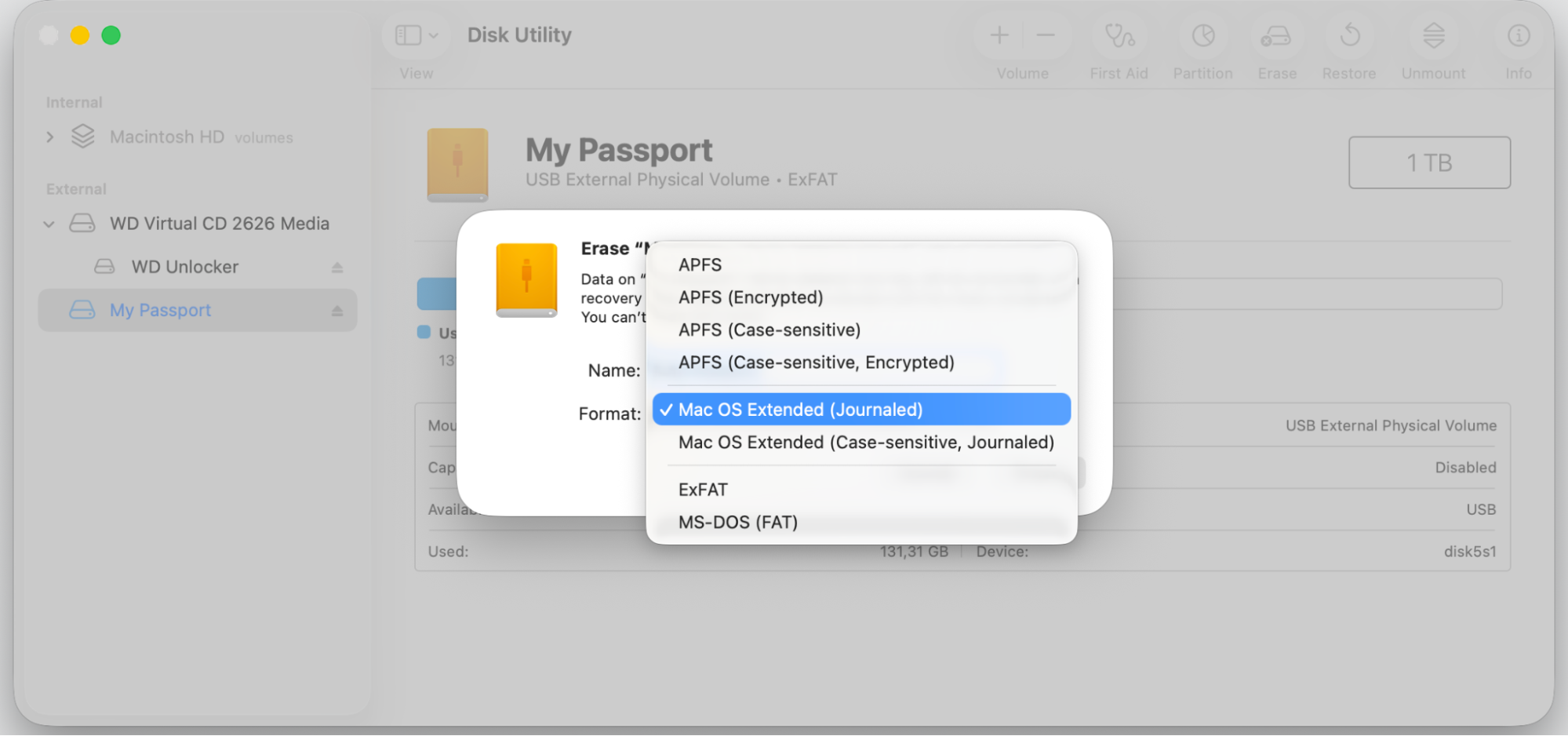 Disk Utility Erase dialog on macOS Ventura with the Format menu open on Mac OS Extended Journaled to reformat the Mac drive.