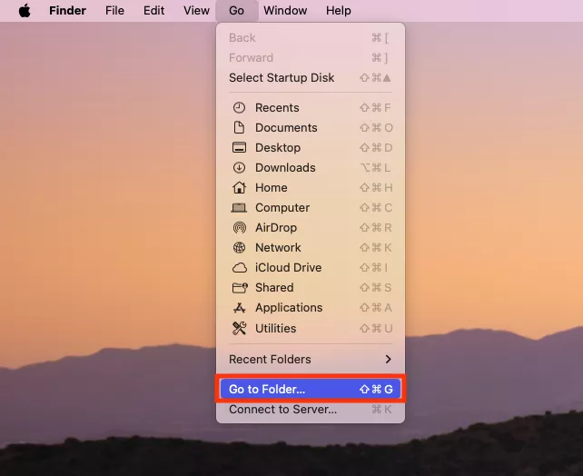 The Go menu in Finder for Mac. To navigate to infected folders, first select Go to Folder.