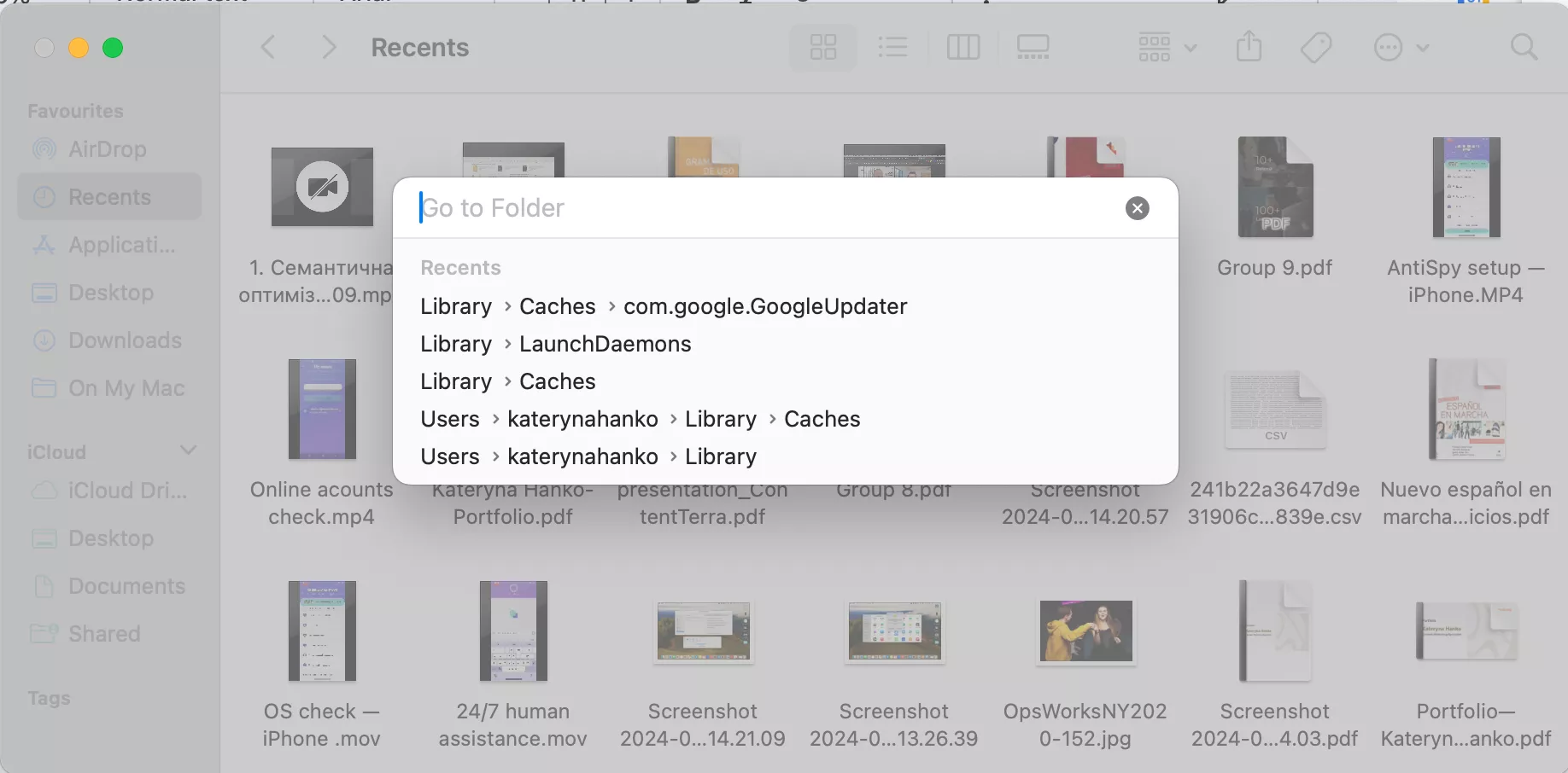 The Finder app opened on Mac which depicts how to launch Got to Folder using Shift + Command + G command to begin the process to clear cache on macOS Catalina.