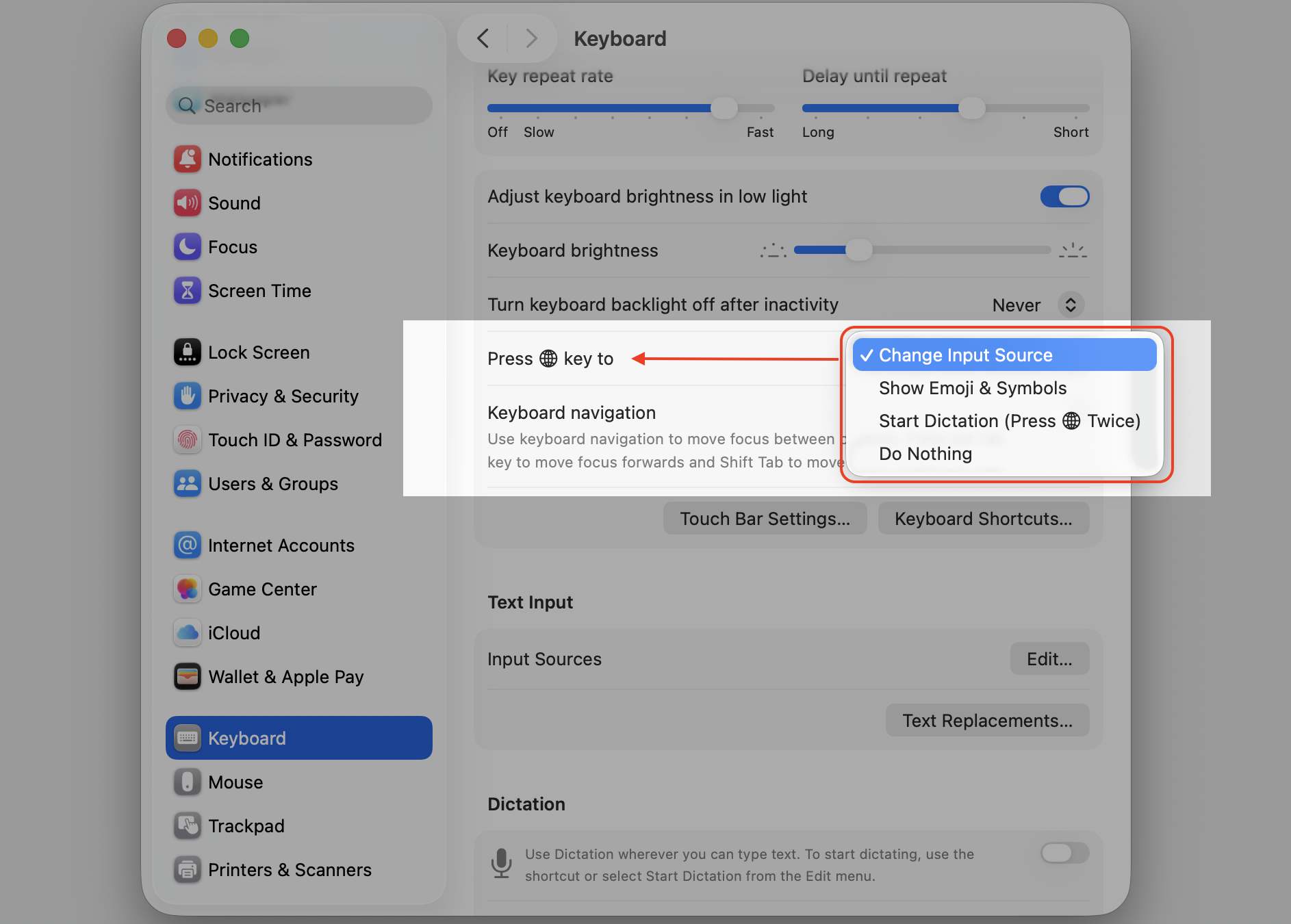 The Keyboard pane in macOS System Settings on a MacBook, setting the Press Globe fn key to option that controls Fn key shortcut behavior.