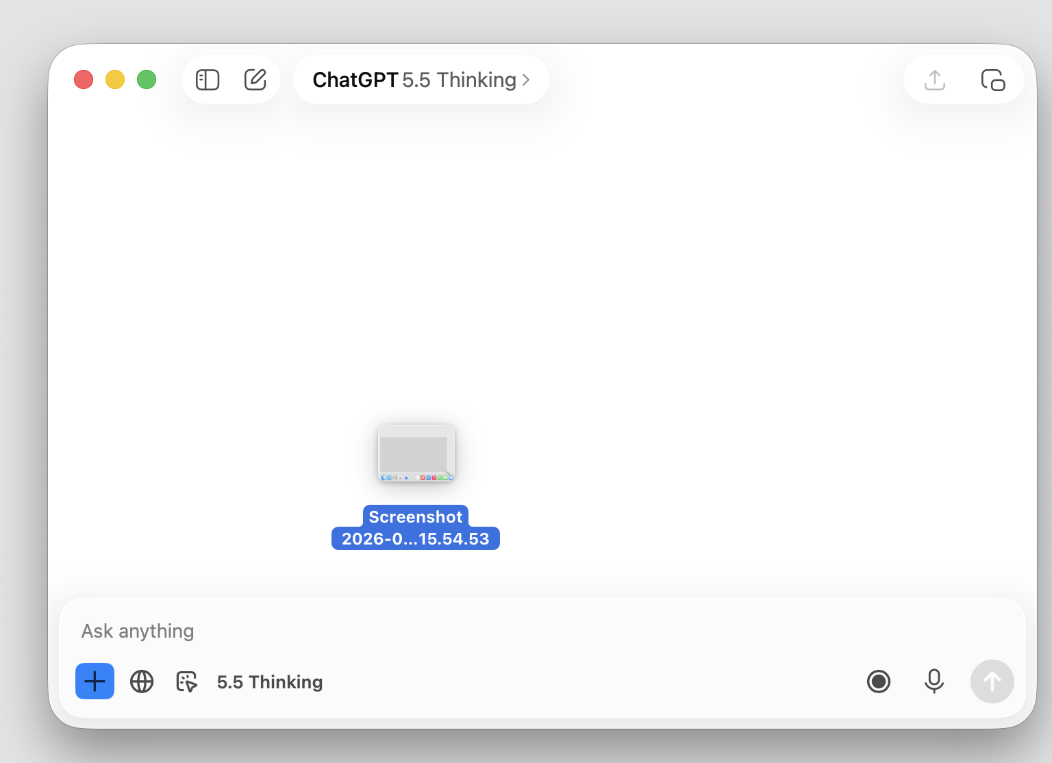 Screenshot file being dragged into the ChatGPT macOS app message field on a MacBook to attach a selected-area capture to the chat.