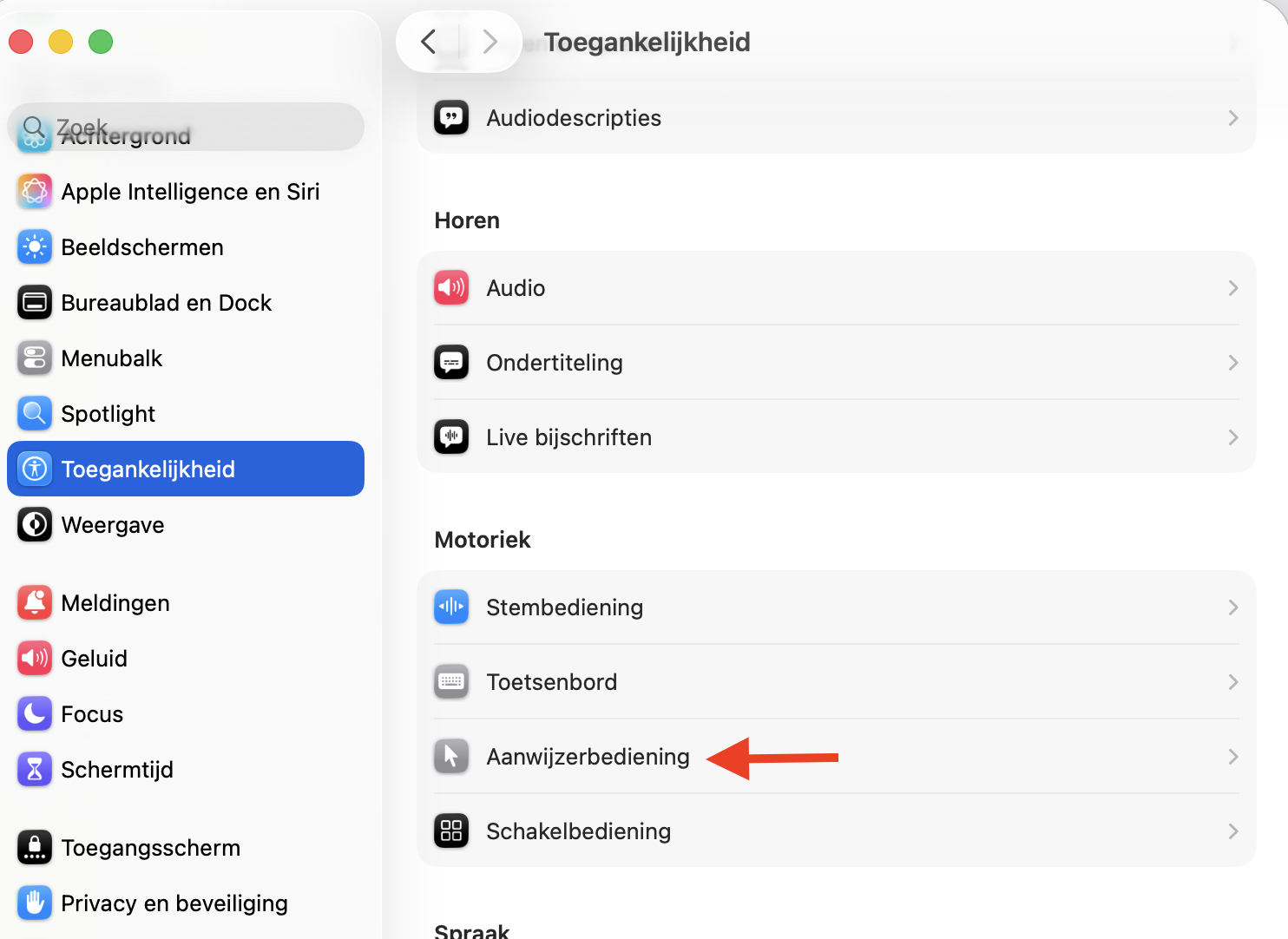 Klik op Toegankelijkheid > Aanwijzerbediening**. Daar vind je alle opties om de scrolrichting van je MacBook aan te passen, evenals de snelheid en timing.