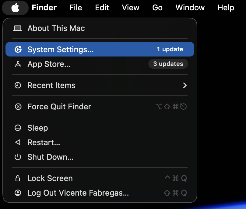 Apple menu open in the top-left corner of a MacBook running macOS Sonoma with System Settings selected to enable fast user switching on Mac.