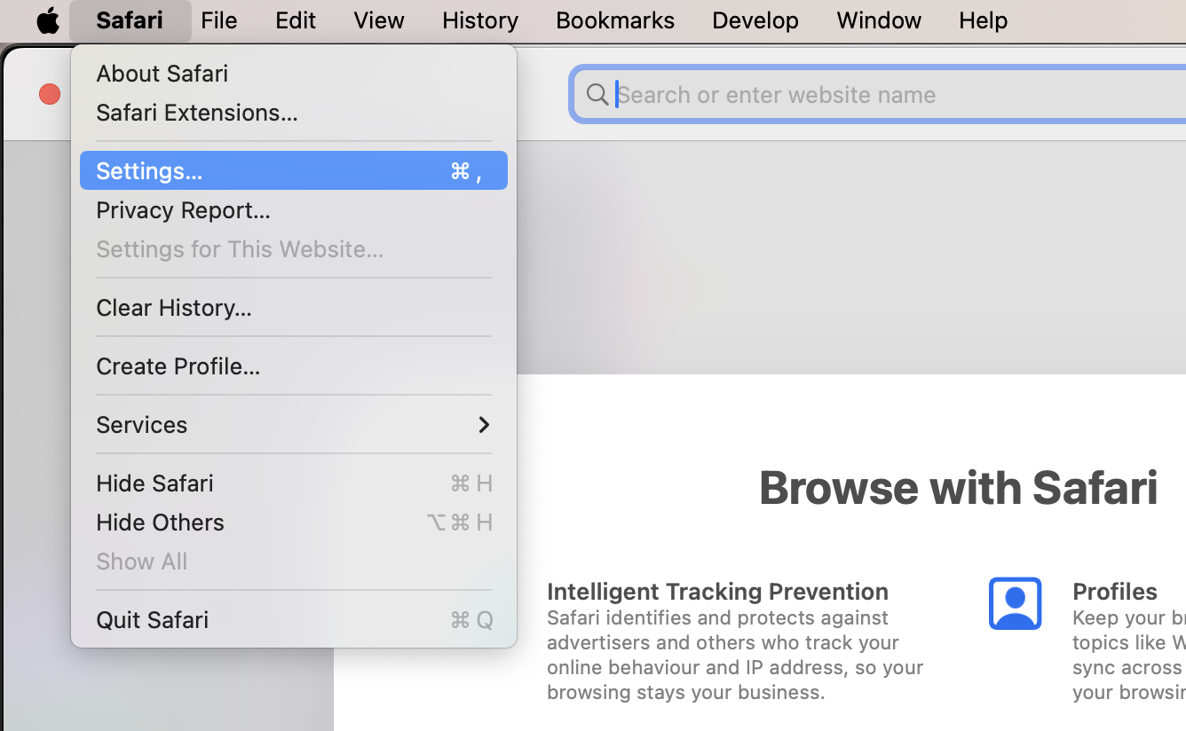 Safari browser, with Safari menu open and Settings highlighted. How to clear and reset Safari, as part of a guide on how to stop fake McAfee pop-ups on Mac.