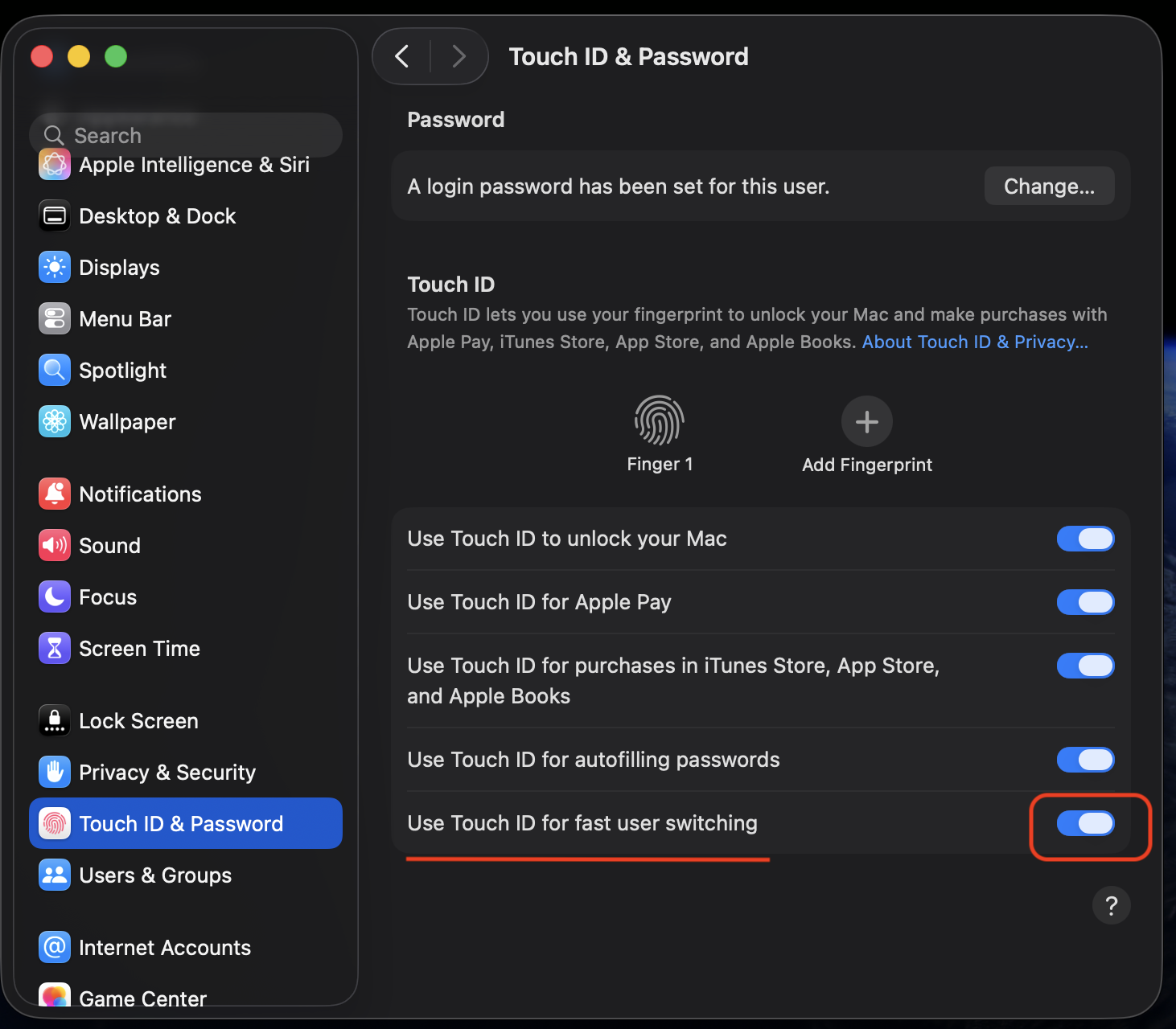 Touch ID & Password settings on a MacBook in macOS Sonoma with the Use Touch ID for fast user switching toggle turned on for seamless account switching.