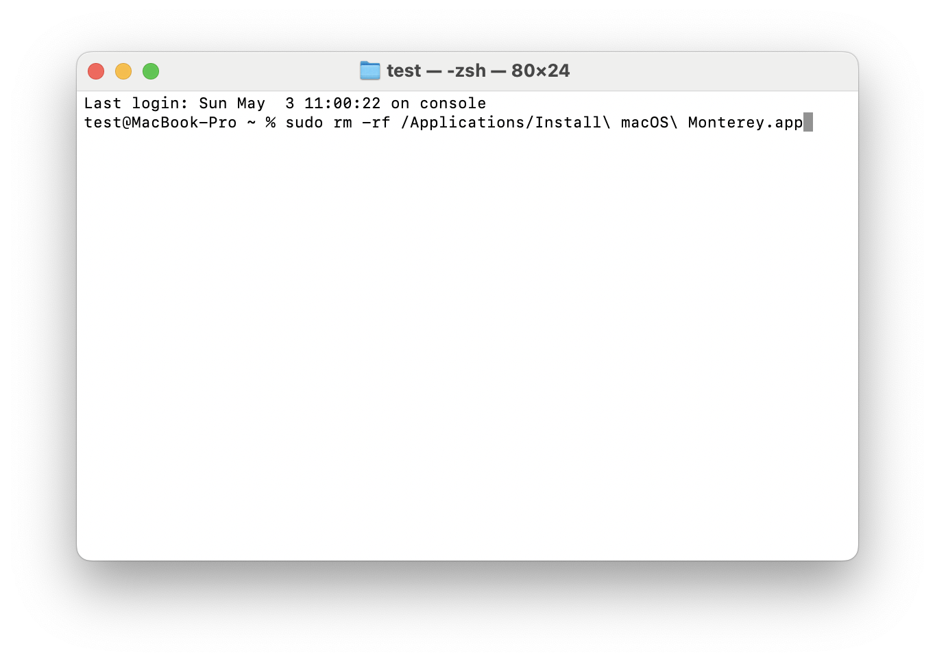 A macOS Terminal window shows the typed command: sudo rm -rf /Applications/Install\ macOS\ Monterey.app with a blinking cursor at the end.
