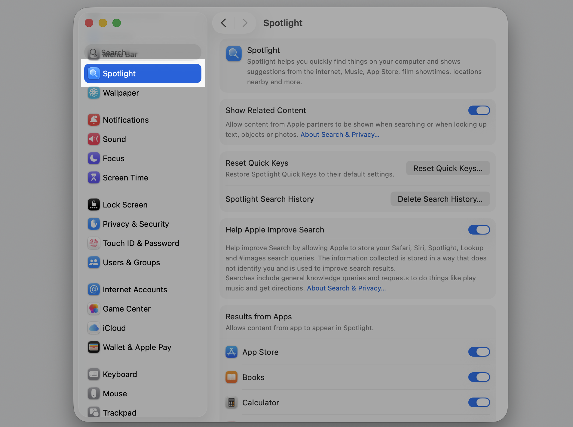 System Settings sidebar on an Apple laptop with Spotlight selected to review indexing that slows the macOS Tahoe Save As dialog.