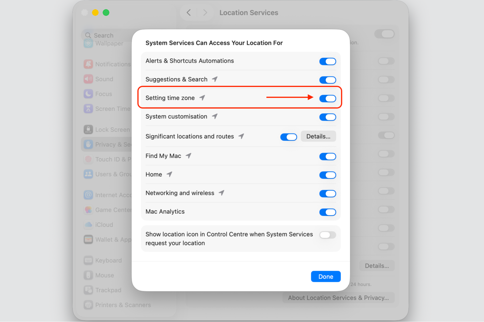 System Services popup on an Apple laptop, turning on Setting time zone then clicking Done in macOS Tahoe Location Services.