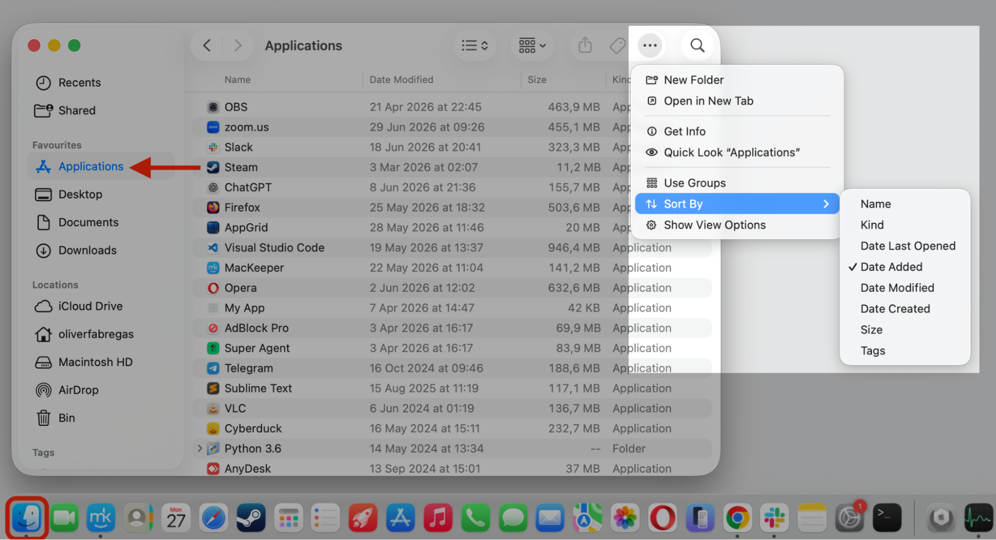 Finder Applications folder on macOS with Sort By set to Date Added, spotting recent installs that spark codesign high CPU on Mac.