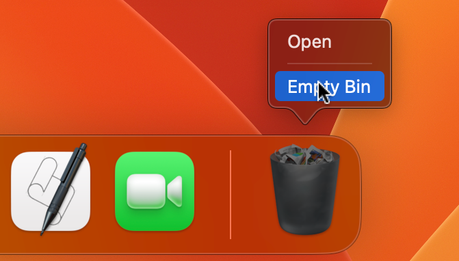 Dock on a Mac with a right-click menu over the Bin icon showing Empty Bin selected to permanently delete Spotify.