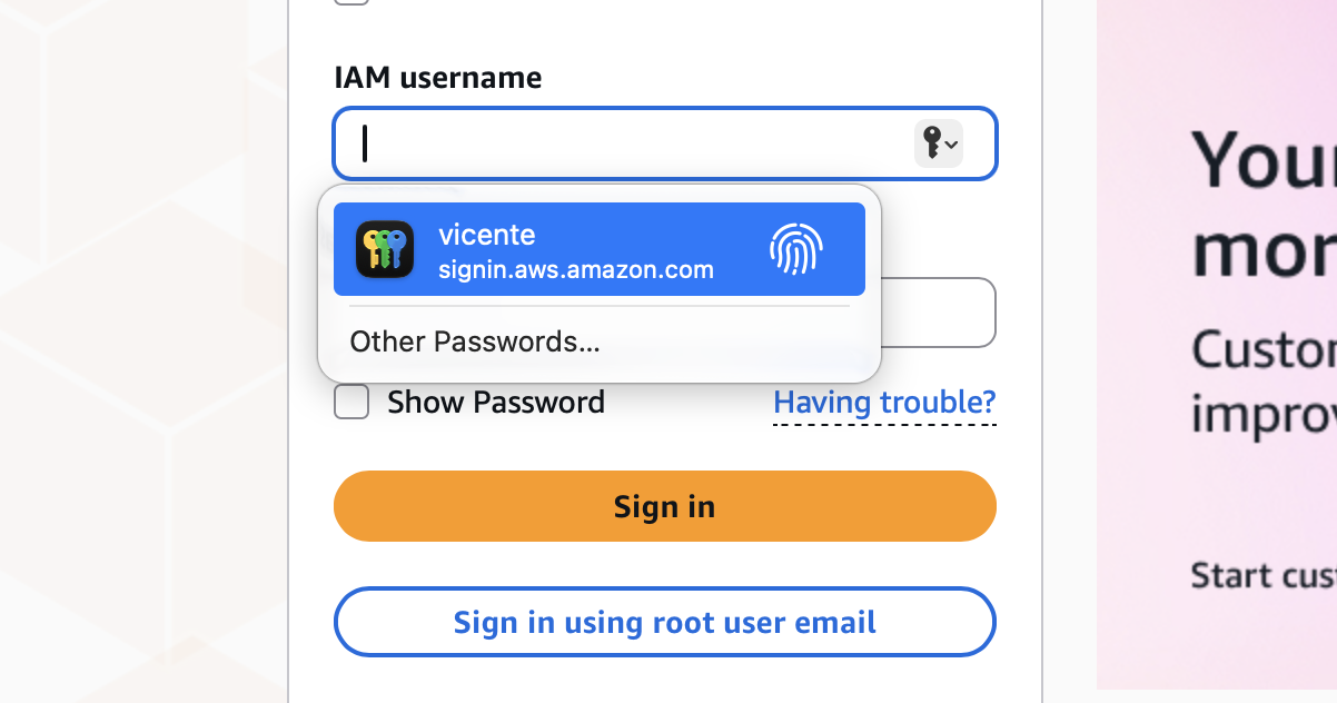 A Safari login page on a MacBook using Touch ID to confirm AutoFill of a password saved in iCloud Keychain on your Apple device.