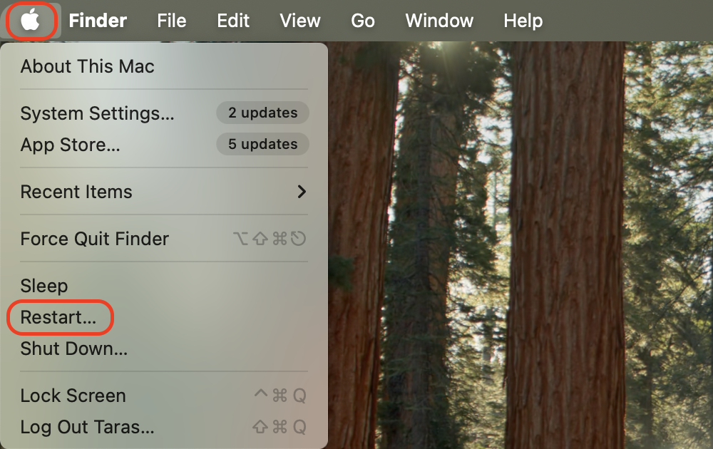 Click the Apple menu icon in the top-left corner of the screen and select Restart... to initiate the reboot process for your Mac.