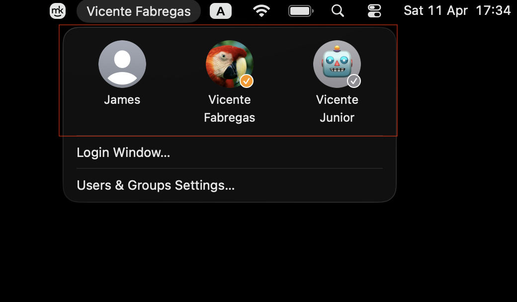 Fast user switching dropdown menu expanded on a MacBook, showing the list of accounts available to select a different user on macOS Sonoma.