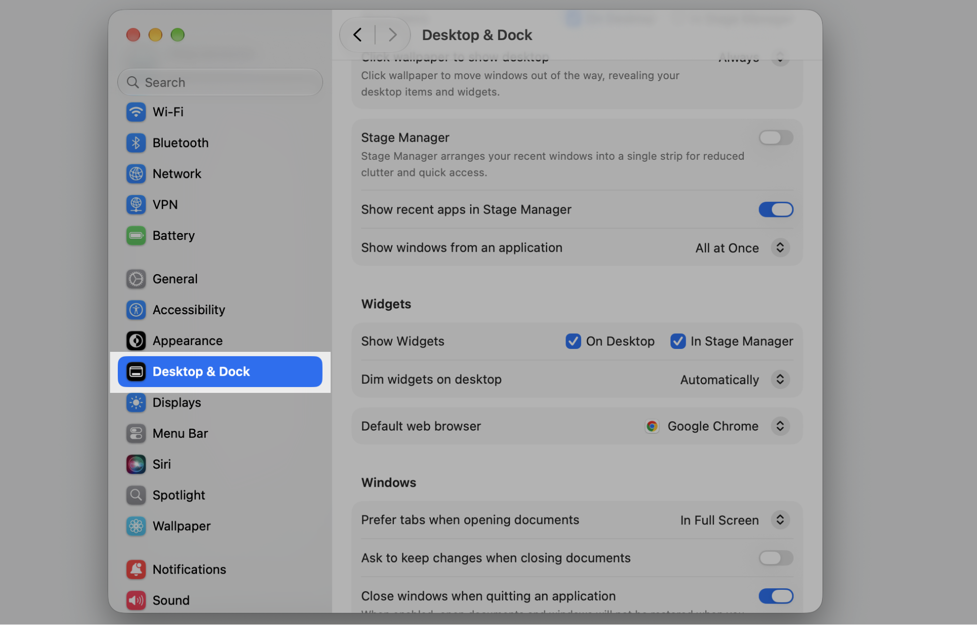 System Settings on a MacBook with Desktop & Dock selected in the macOS sidebar to change the default web browser from Avast.