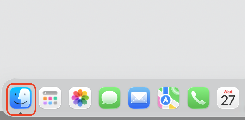 The macOS Tahoe Dock with the Finder icon highlighted, the first step to pin the Applications folder and get Launchpad back on a Mac.