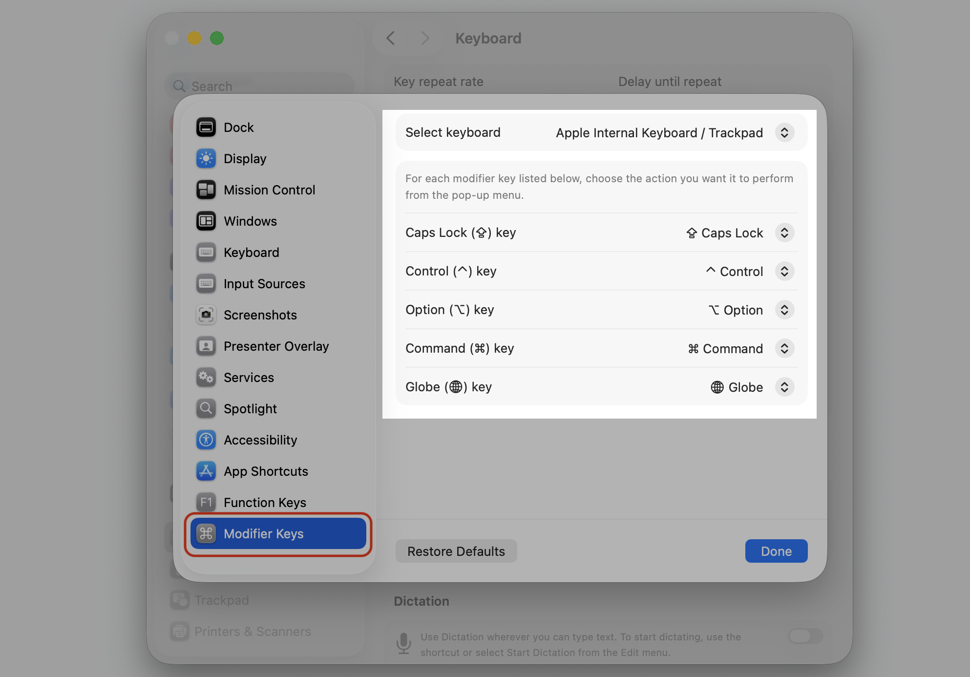 The Modifier Keys sheet in macOS Keyboard Shortcuts on a MacBook, confirming Command, Option, and Control keep their default functions.