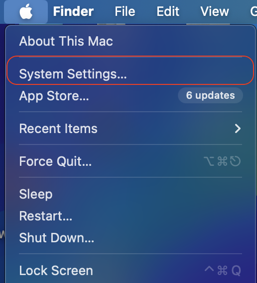 The Apple menu is opened on a MacBook device. Select System Settings to start fixing the Syncing with iCloud paused error on a Mac.
