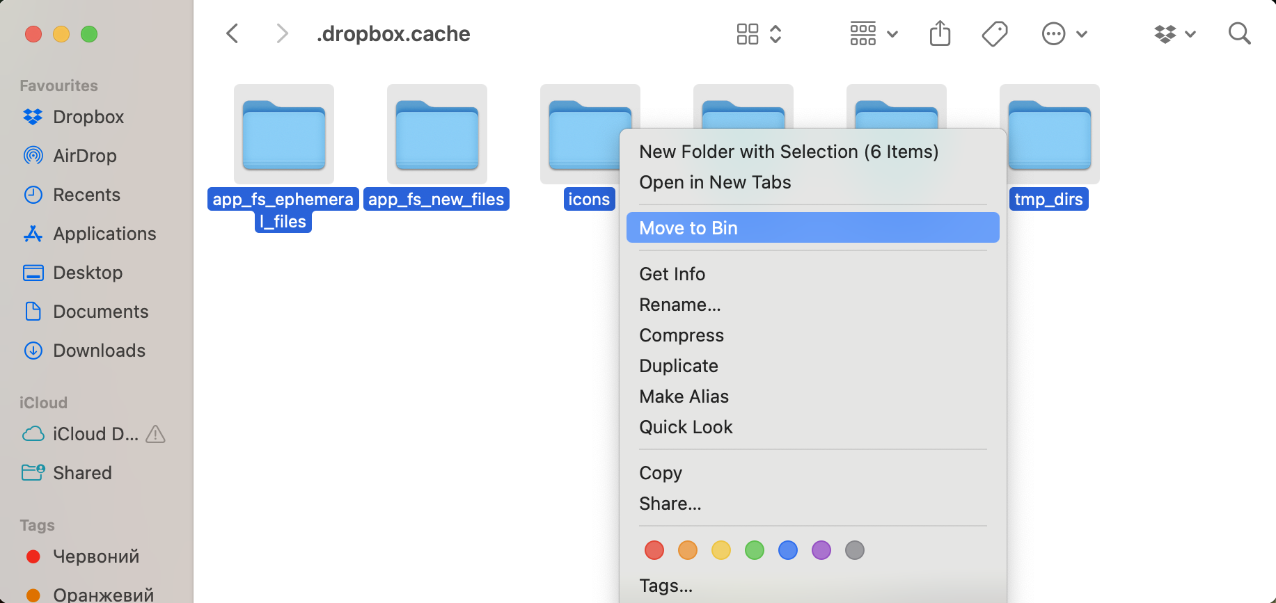 Select all items inside the .dropbox.cache folder and delete them to clear Dropbox's temporary cache data.