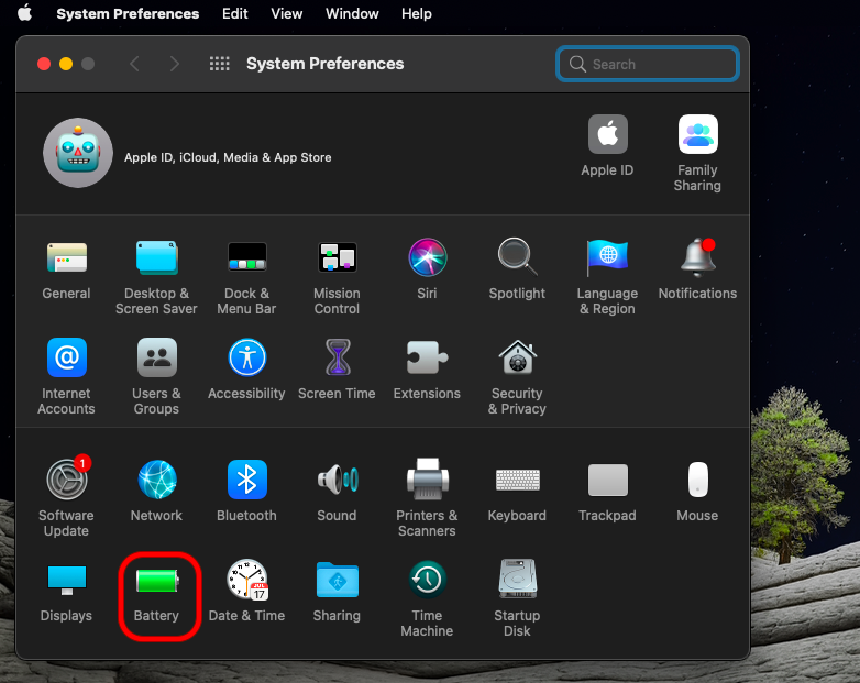 System Preferences window on macOS Monterey with the Battery icon highlighted to open the Schedule pane for an automatic Mac shutdown.