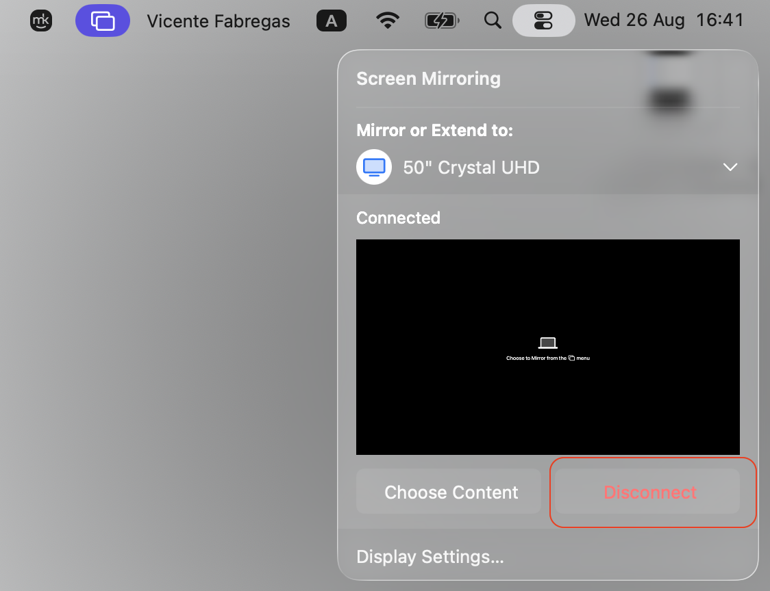 Screen Mirroring panel on macOS with the red Disconnect button highlighted to end screen mirroring between the MacBook and the Roku TV.