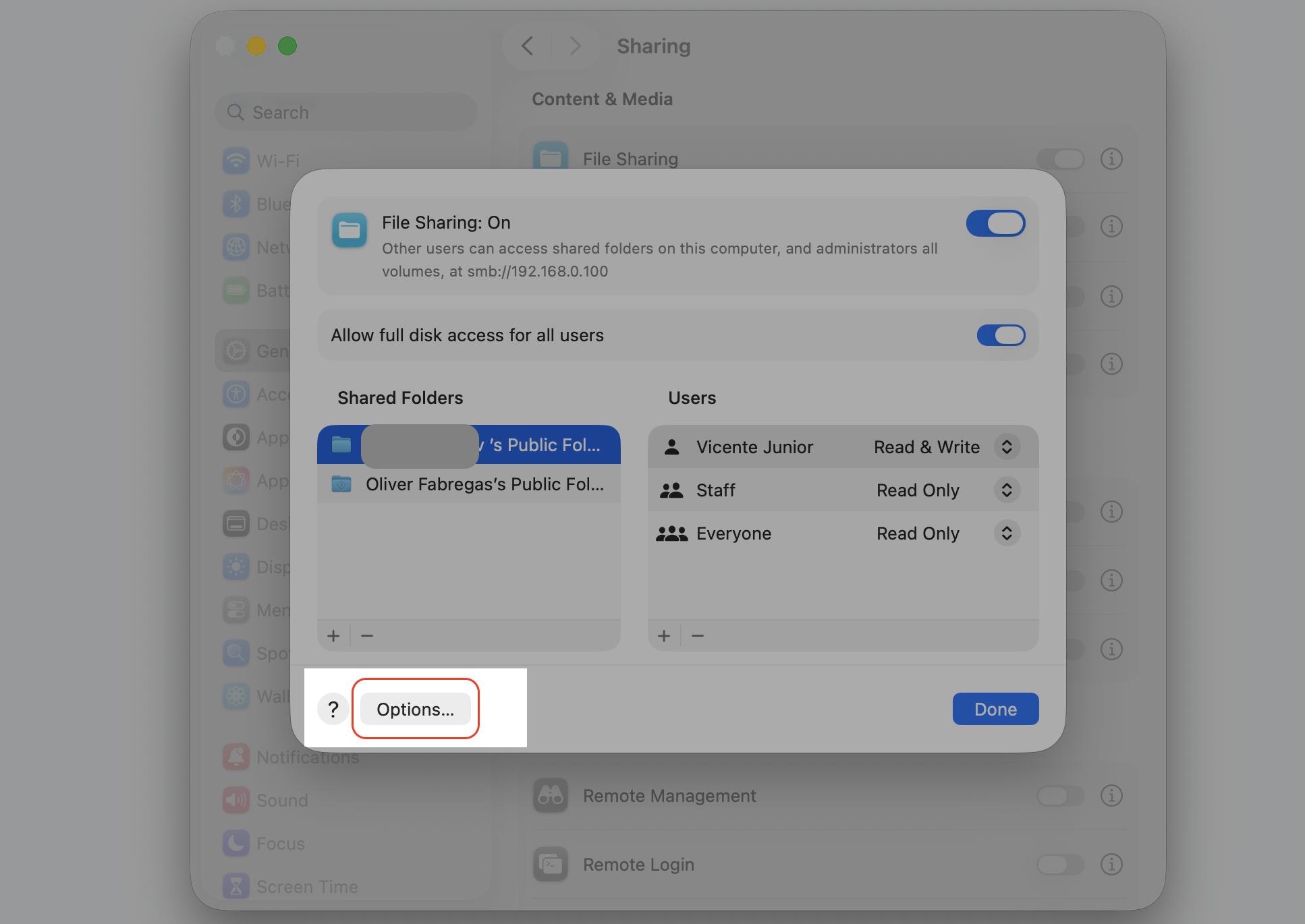 The File Sharing options sheet on a Mac, where you click the Options button to open SMB settings for sharing files with Windows.