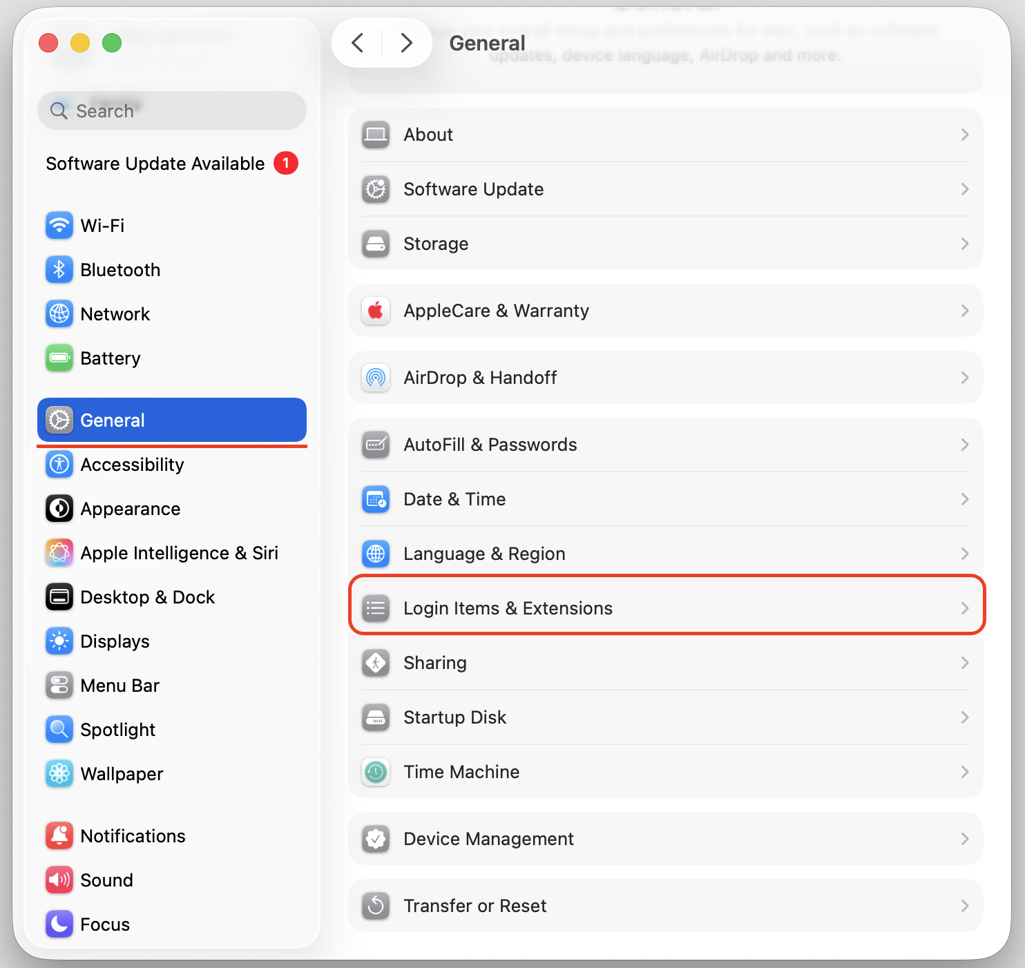 macOS System Settings on a MacBook showing General with Login Items and Extensions selected to review startup apps on the Apple computer.