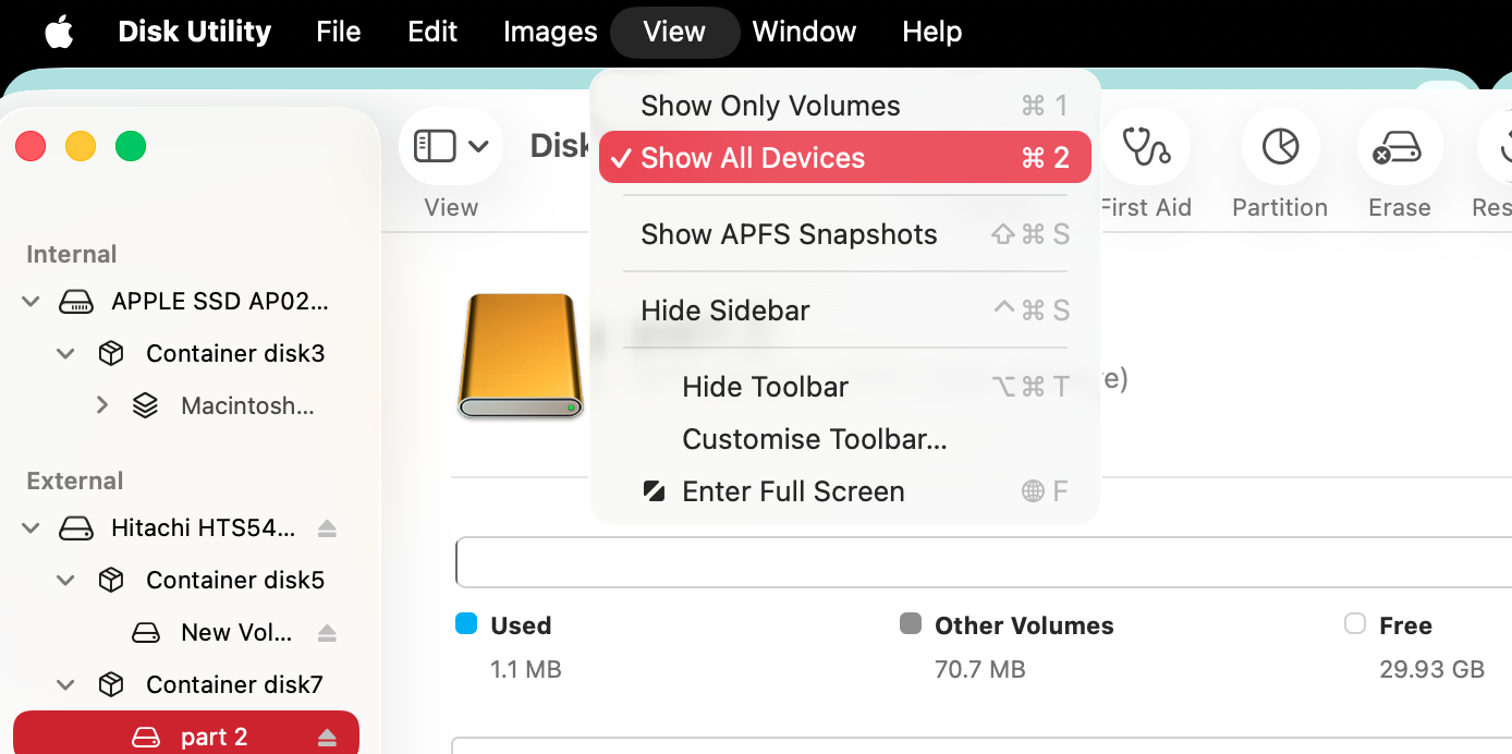 Instead of deleting the entire drive, you can just erase a single volume within the drive. In Disk Utility, select View > Show All Devices from the menu bar.