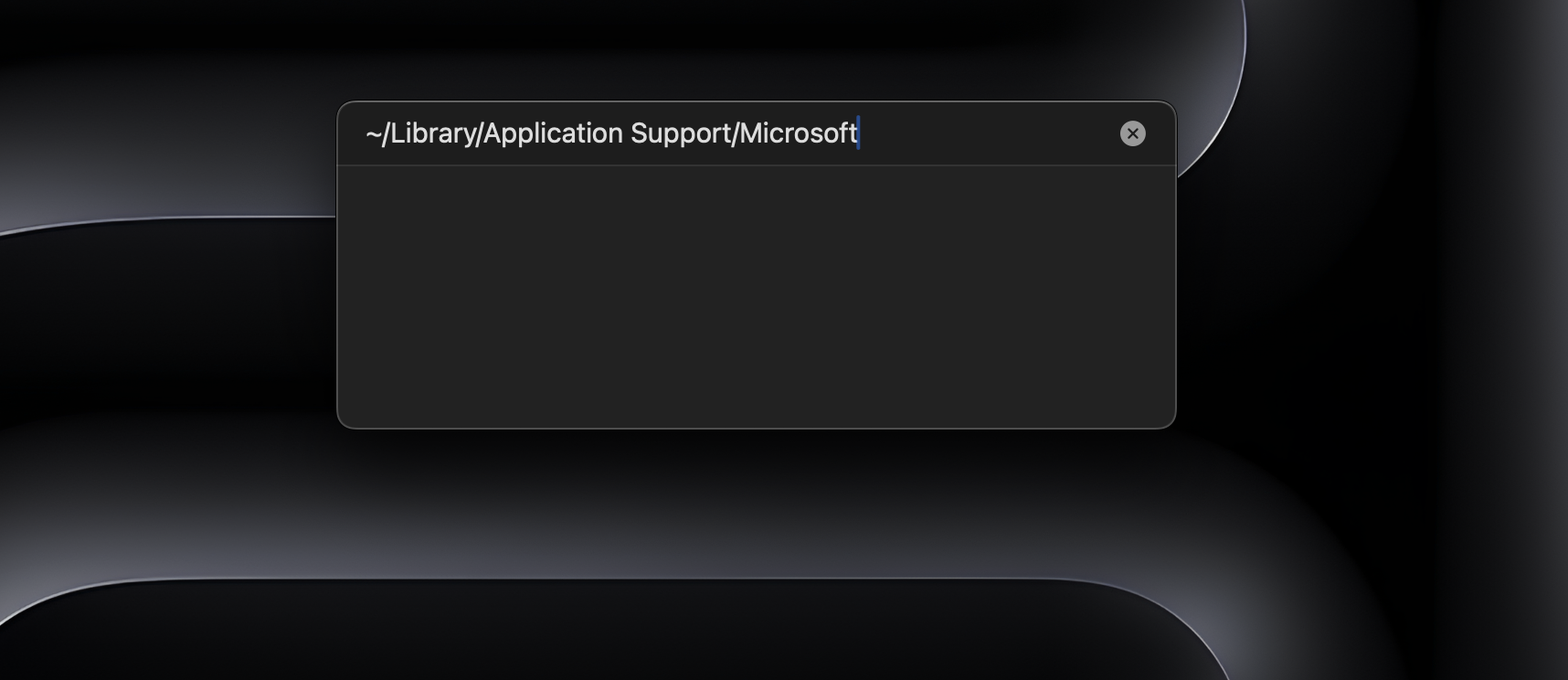 Das Popup-Fenster Gehe zu Ordner wird über den Finder auf dem Mac geöffnet und der Pfad /Library/Application Support/Microsoft wird in die Suchleiste eingegeben.