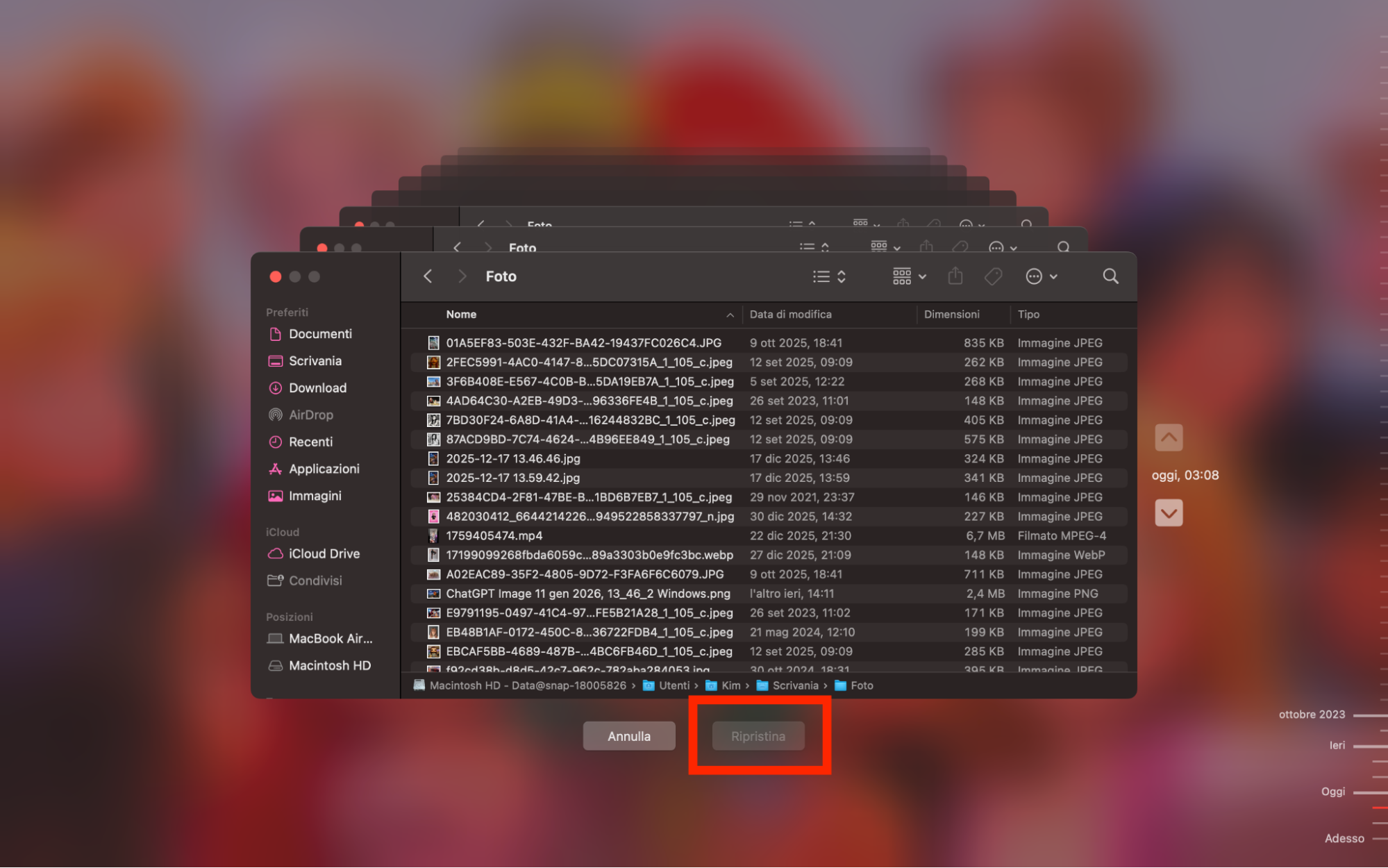 Quando trovi un backup da ripristinare, fai clic sul pulsante Ripristina sotto la finestra desiderata in Time Machine.