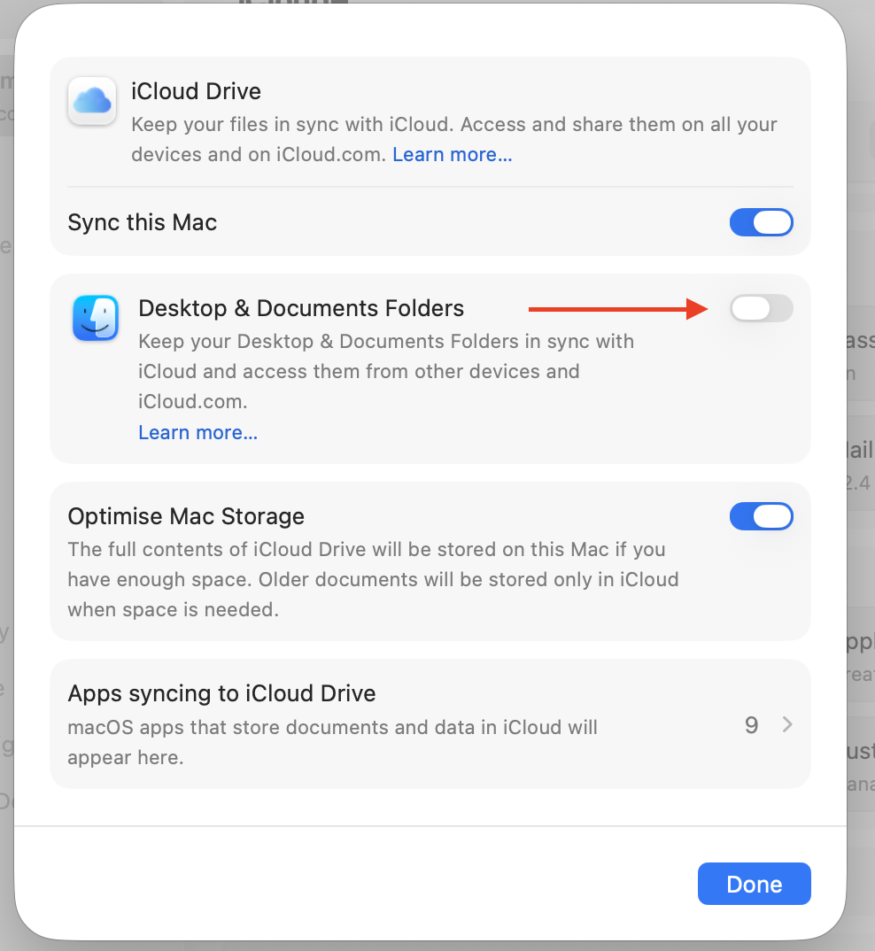 iCloud Drive options on an Apple computer with Desktop & Documents Folders toggled off to pause syncing while testing file saves.