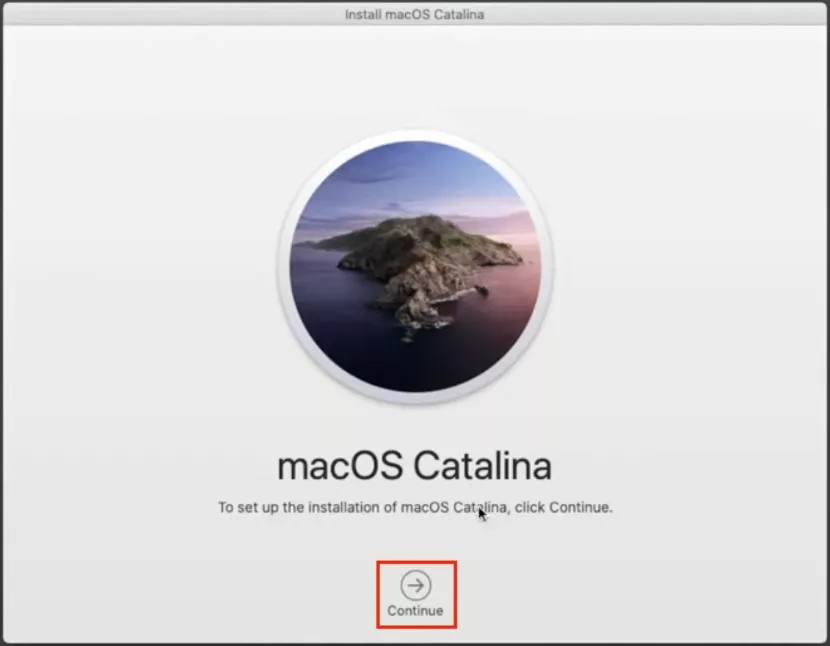 The Install macOS Catalina window is opened on a MacBook device. Click the Continue button at the bottom to reinstall macOS Catalina.