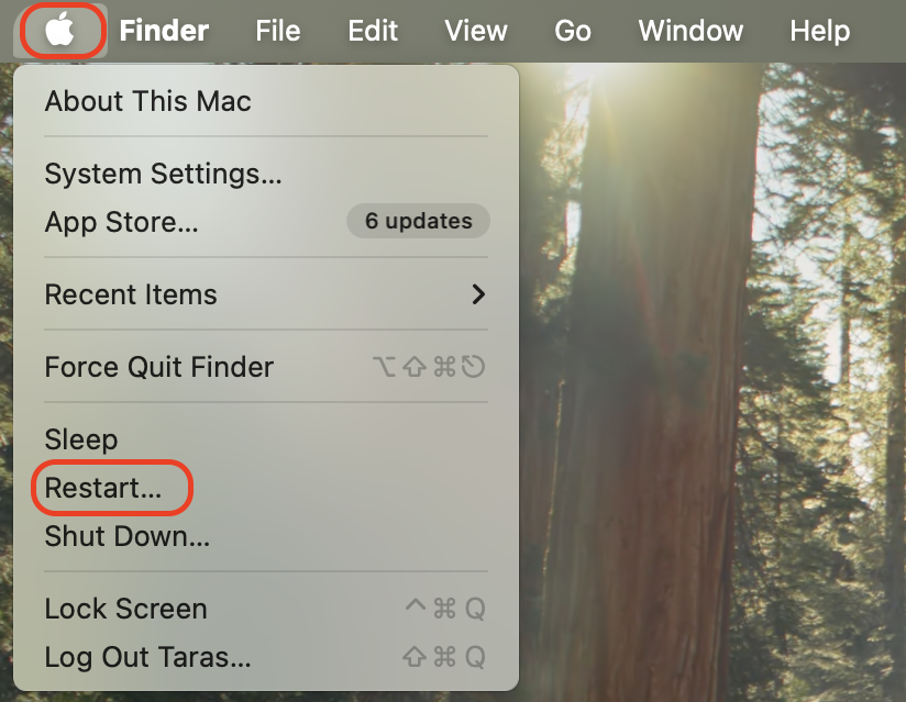 Click the Apple menu, select Restart, then sign back in and open Slack to check whether your notification banners appear again.