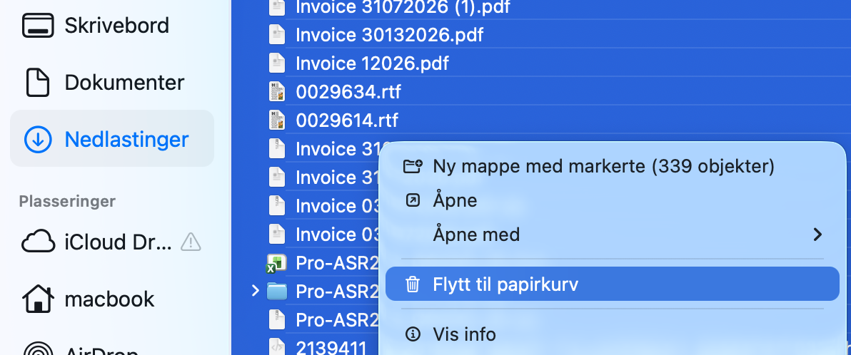 Merk alt som for øyeblikket er i nedlastingsmappen din på Macen, send det deretter til papirkurven og slett alt.