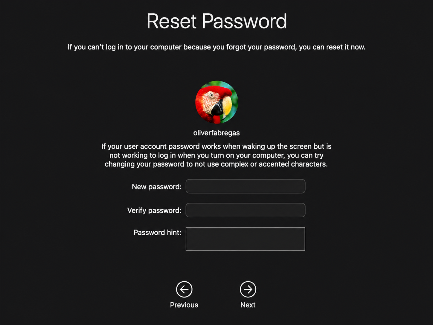 The macOS Reset Password screen on a MacBook with New password and Verify fields to set a fresh Mac login password after using the Recovery Key.