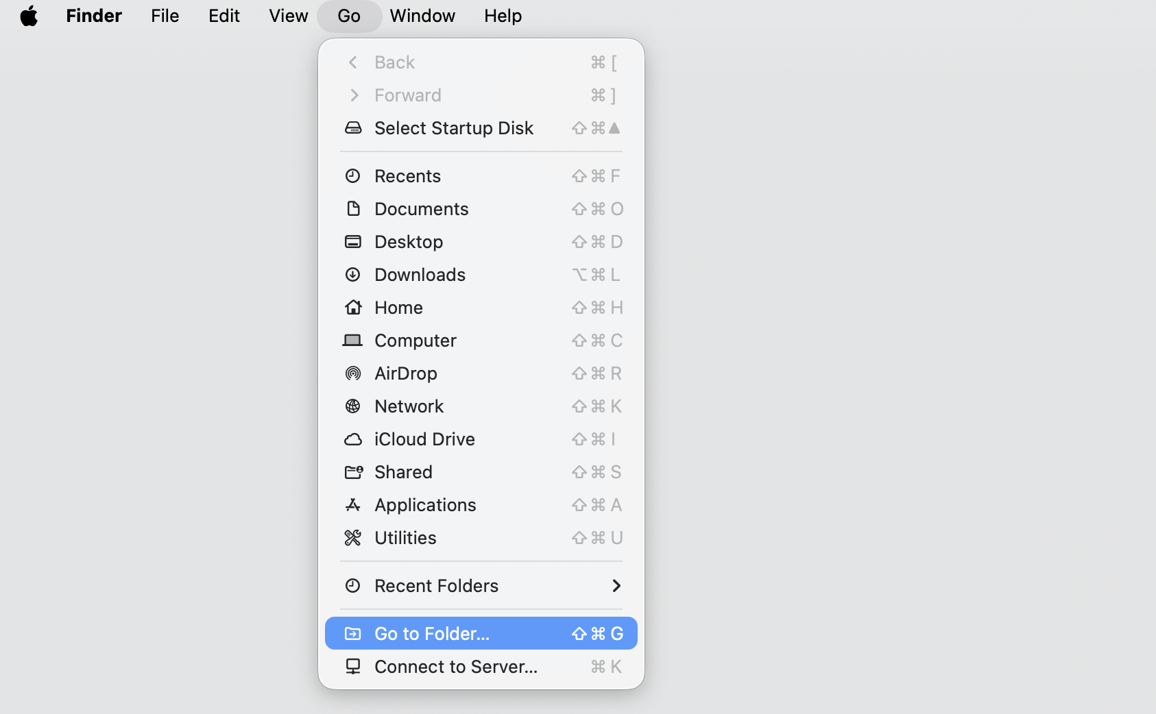 Finder Go menu on macOS with Go to Folder selected, the first step to clear App Store cache causing installd high CPU usage.